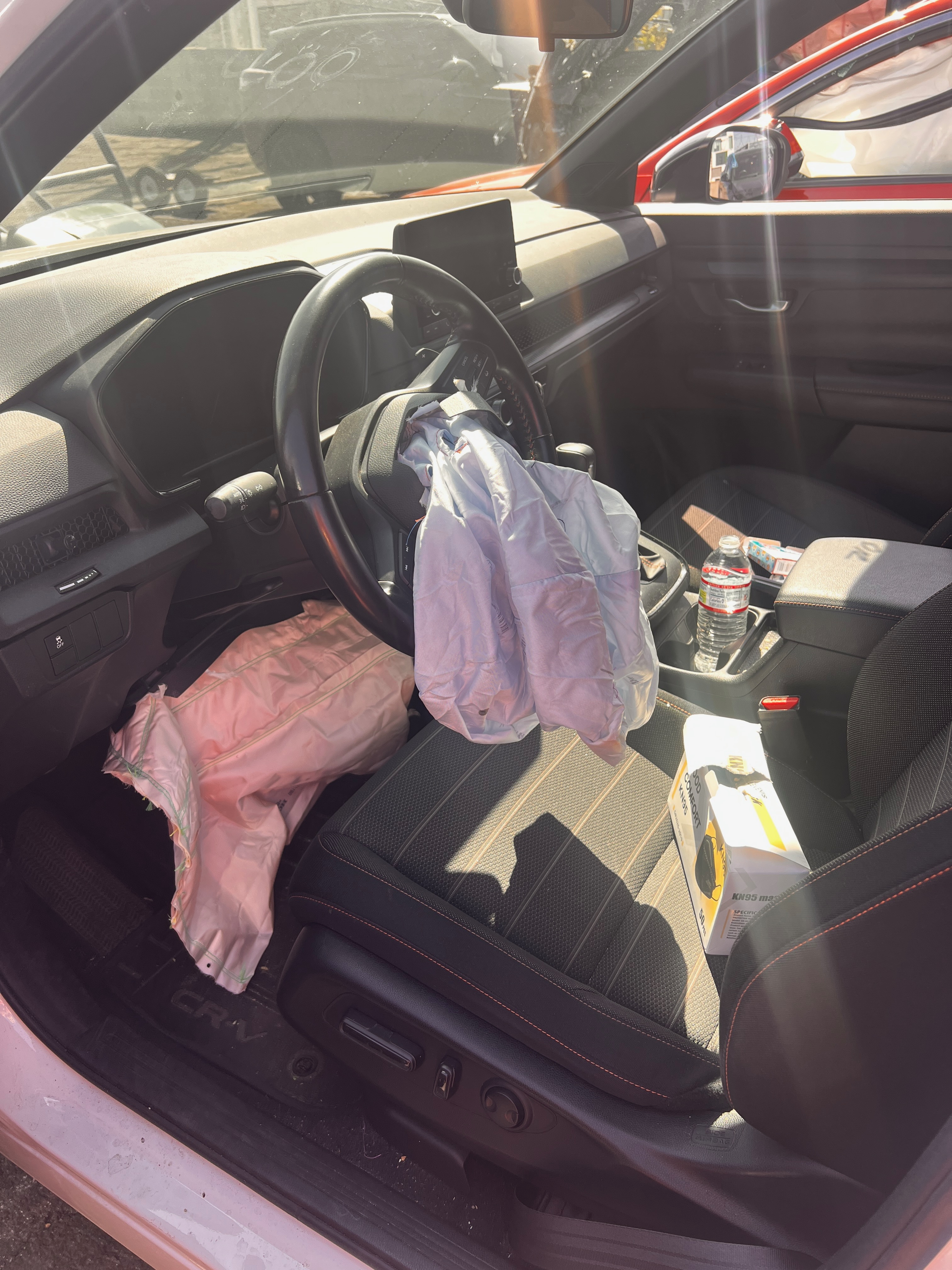 Deployed airbags and the aftermath of the car accident at Western Avenue and Melrose Avenue, Los Angeles